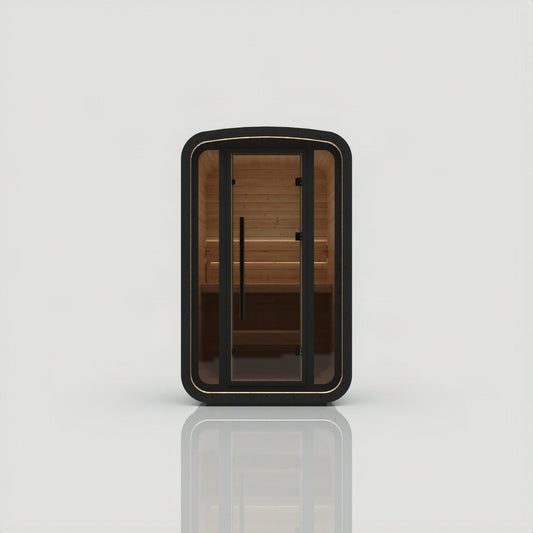 Hekla Mini Cube Nero outdoor sauna, front view with black frame, glass door and pale thermo aspen bench
