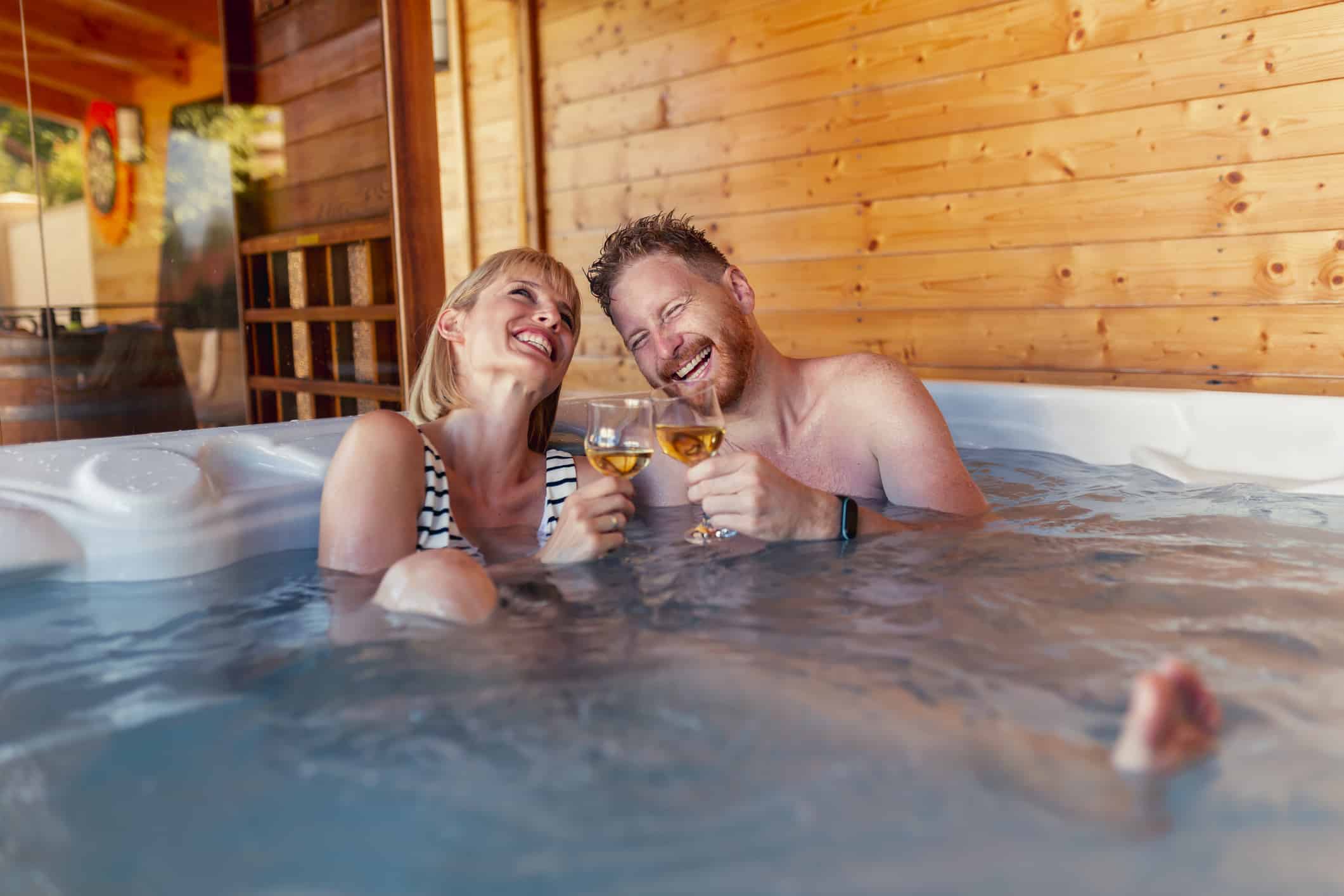 Couple Relaxing In Hot Tub